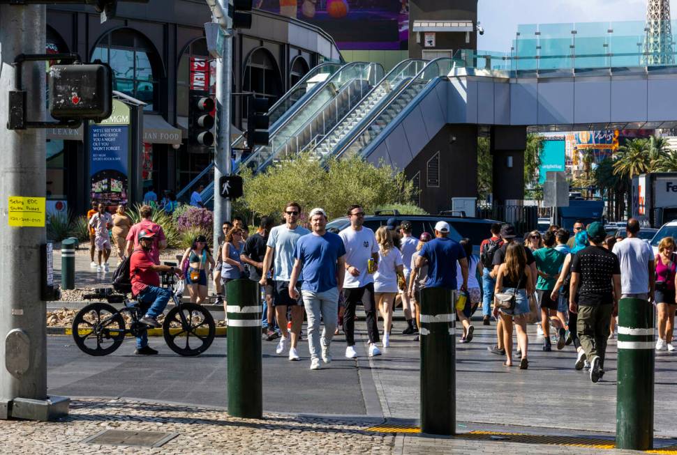 Crowds walk along the Strip on Friday, May 19, 2023, in Las Vegas. (L.E. Baskow/Las Vegas Revie ...