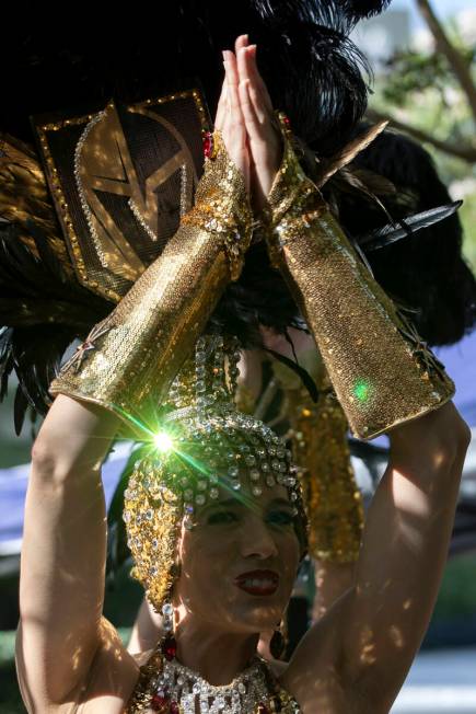 A Vegas Belle parades to T-Mobile Arena before Game 1 of the Western Conference Final playoff s ...