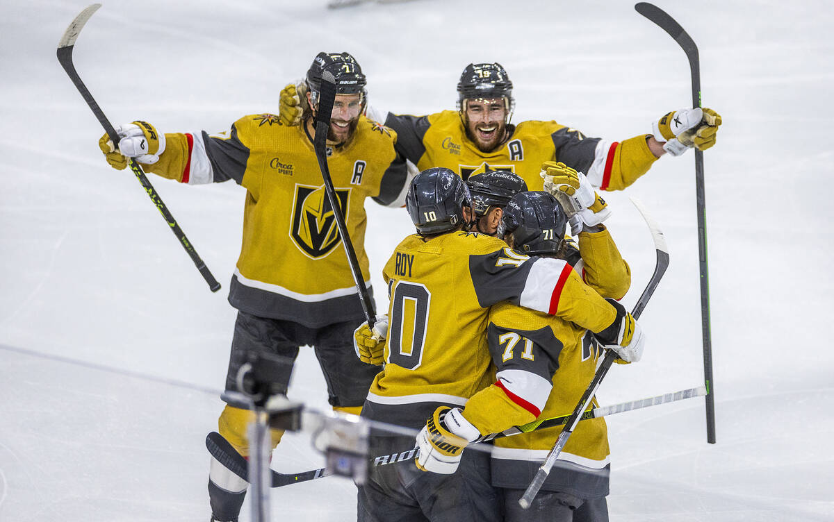 Golden Knights center William Karlsson (71) and teammates celebrate another goal against the Da ...