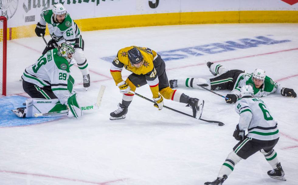 Golden Knights center Ivan Barbashev (49) looks to score against Dallas Stars goaltender Jake O ...