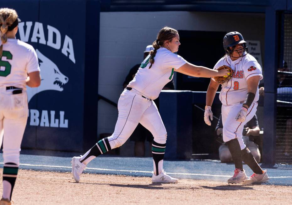 Douglas High's Dakota Till forced out by Palo Verde High's first baseman Cameron Lauretta durin ...