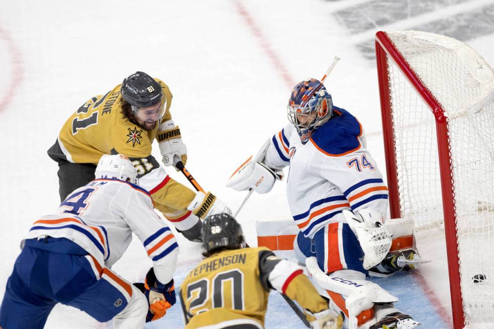 Golden Knights right wing Mark Stone (61) scores on Edmonton Oilers goaltender Stuart Skinner ( ...