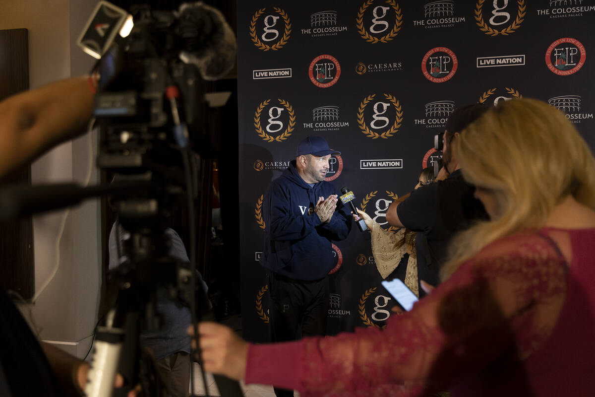 Garth Brooks speaks during a news conference ahead of his "Garth Brooks/PLUS ONE" res ...