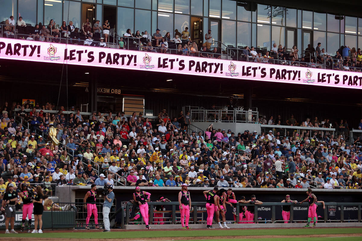 The Party Animals stand near their dug out during the Banana Ball World Tour at the Las Vegas B ...