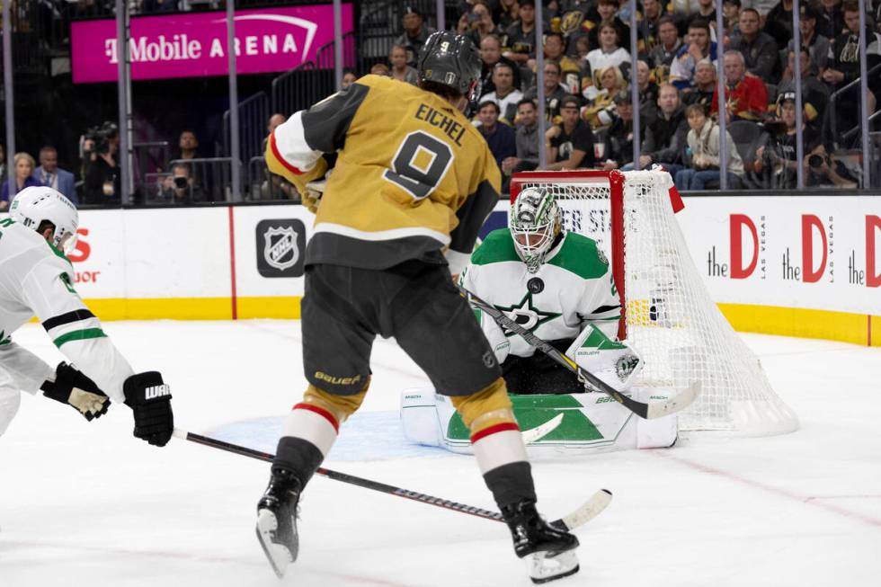 Golden Knights center Jack Eichel (9) attempts to score on Dallas Stars goaltender Jake Oetting ...