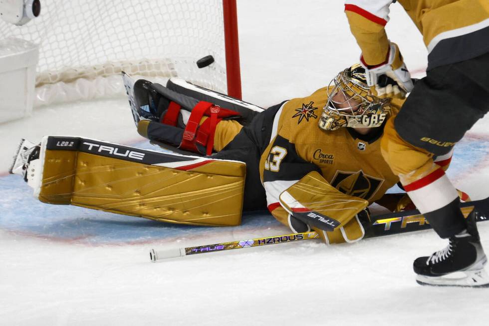 Golden Knights goaltender Adin Hill (33) cannot stop a shot by Dallas Stars left wing Jason Rob ...