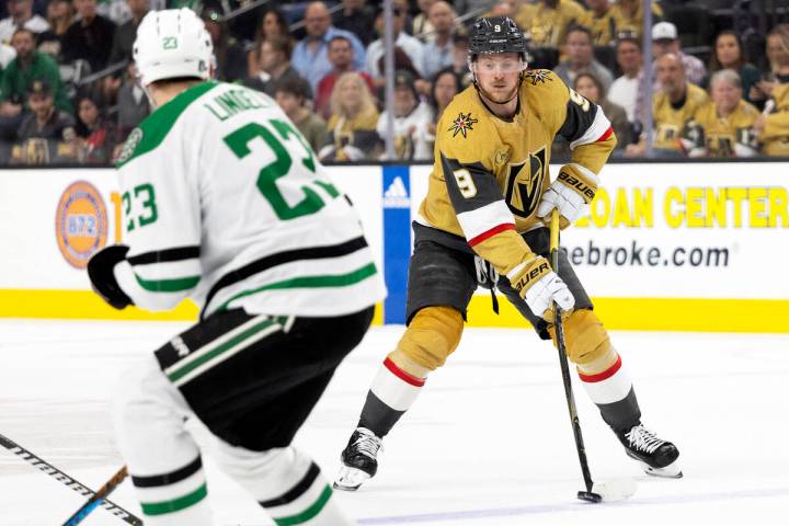 Golden Knights center Jack Eichel (9) skates with the puck against Dallas Stars defenseman Esa ...