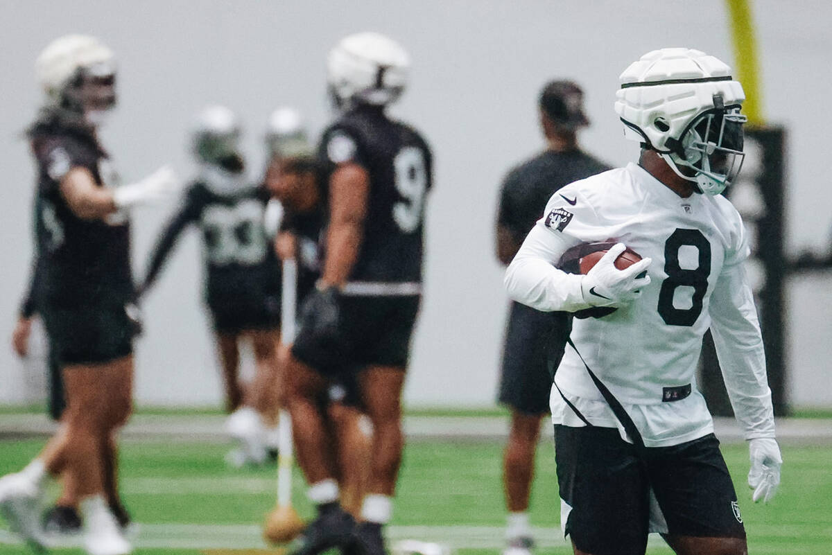 Raiders running back Josh Jacobs (8) runs a drill during practice at the Intermountain Healthca ...