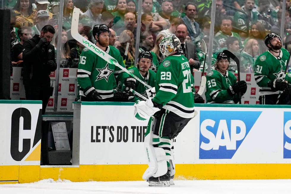 Dallas Stars goaltender Jake Oettinger leaves the ice after being pulled during the first perio ...