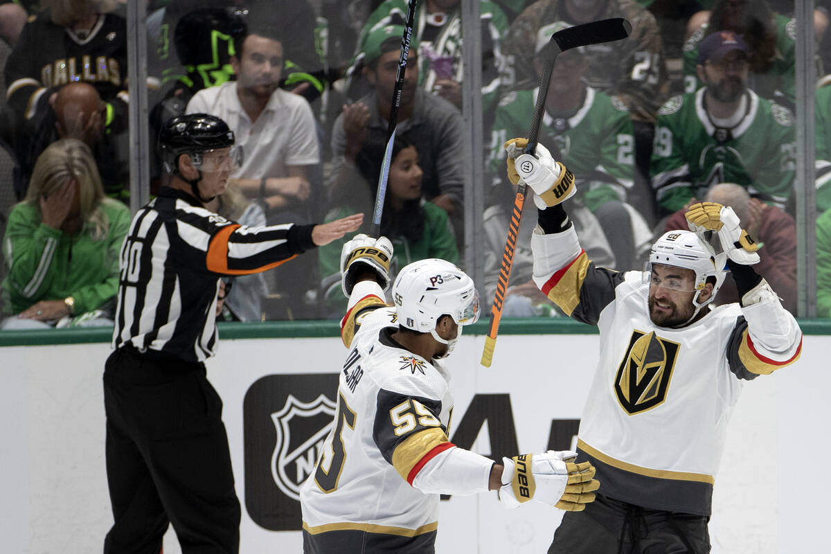 Golden Knights right wing Keegan Kolesar (55) and left wing William Carrier (28) celebrate afte ...