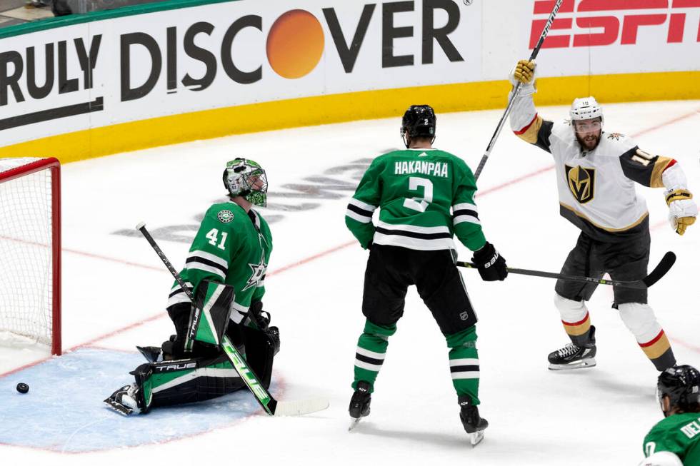 Golden Knights center Nicolas Roy (10) celebrates after defenseman Alex Pietrangelo, out of fra ...