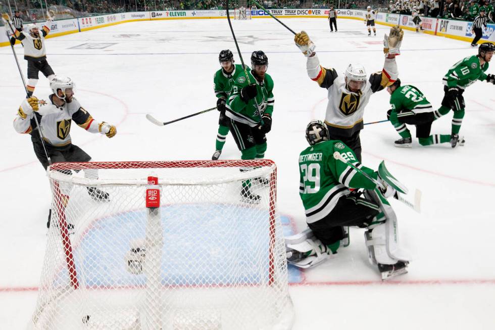 The Golden Knights celebrate after center Ivan Barbashev, out of frame, scored on Dallas Stars ...