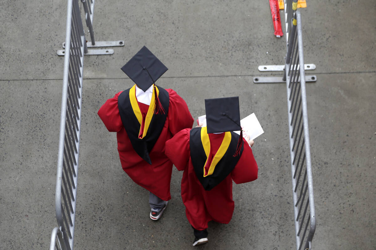 FILE - New graduates walk into the High Point Solutions Stadium before the start of the Rutgers ...