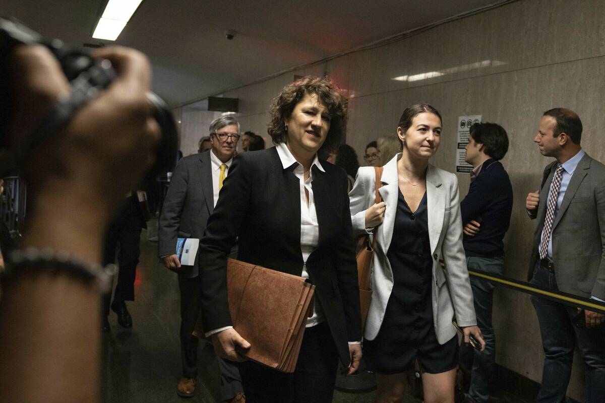 Prosecutor Susan Hoffinger arrives at New York Supreme Court, Tuesday, May 23, 2023 in New York ...