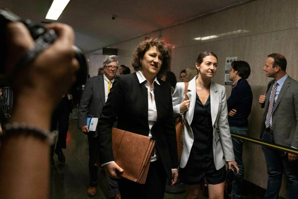 Prosecutor Susan Hoffinger arrives at New York Supreme Court, Tuesday, May 23, 2023 in New York ...