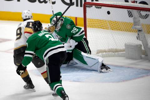 Dallas Stars goaltender Jake Oettinger (29) misses the save on a shot by Golden Knights right w ...