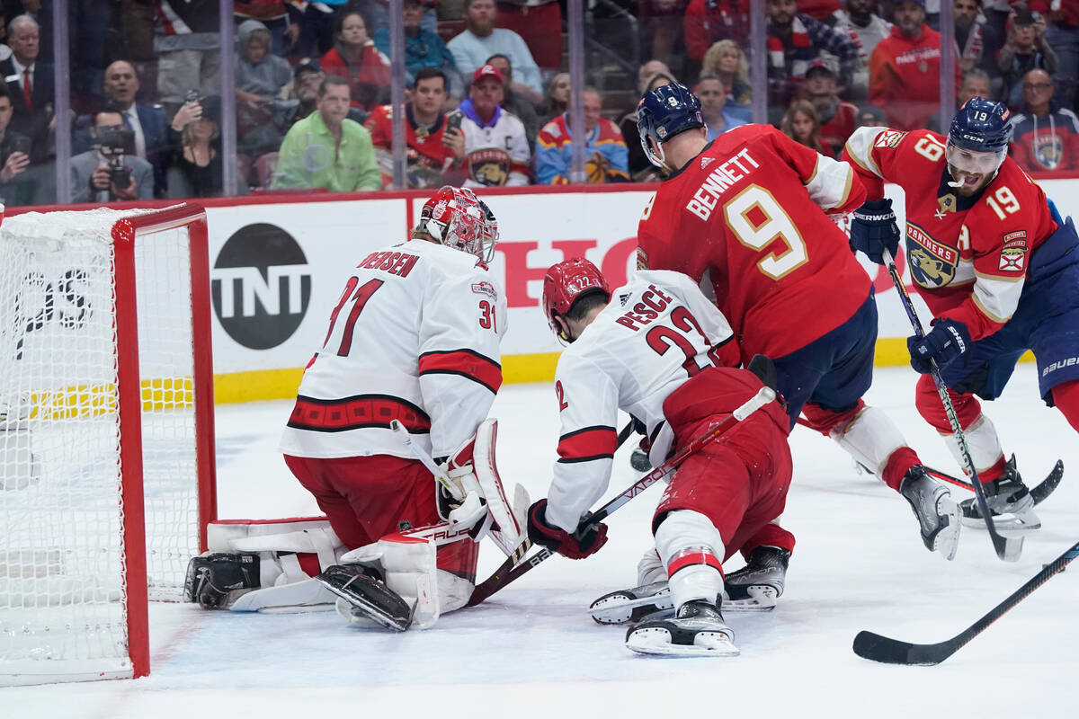 Florida Panthers left wing Matthew Tkachuk, right, shoots and scores against Carolina Hurricane ...