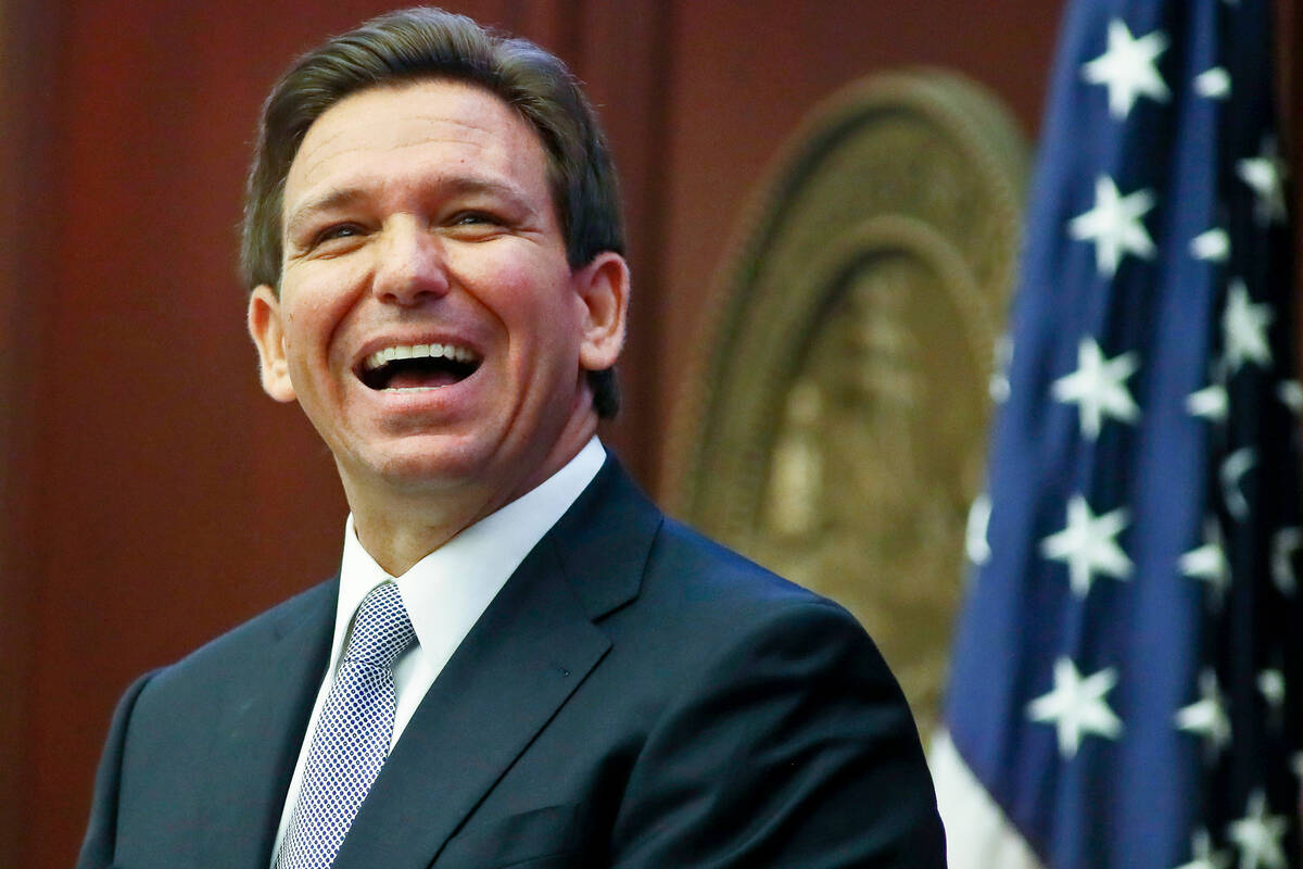 Florida Gov. Ron DeSantis reacts to applause as he gives his State of the State address during ...