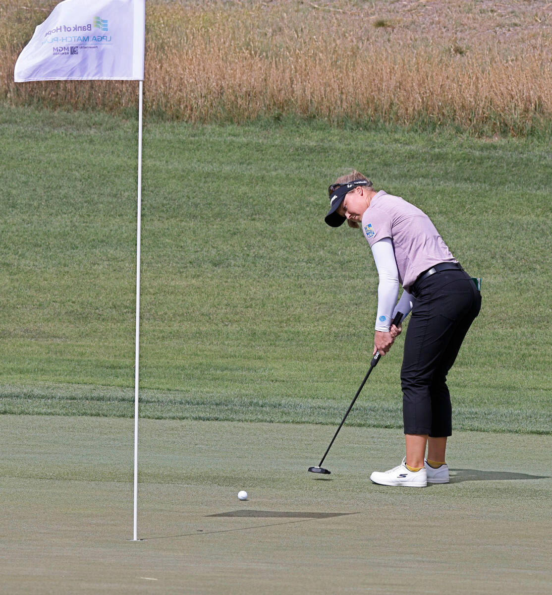 Brooke Henderson of Canada putts on the 12th green during the second day of round-robin play in ...