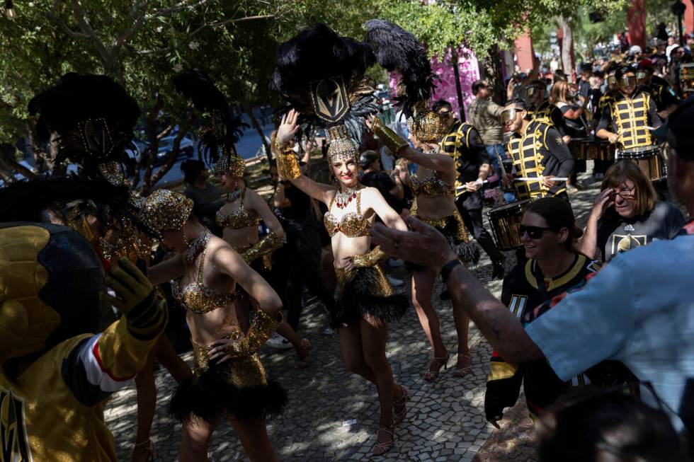 The Golden Knights parade travels through fans toward T-Mobile Arena before Game 5 of the NHL h ...