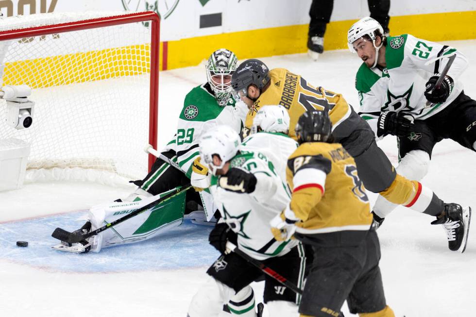 Golden Knights center Ivan Barbashev (49) scores on Dallas Stars goaltender Jake Oettinger (29) ...