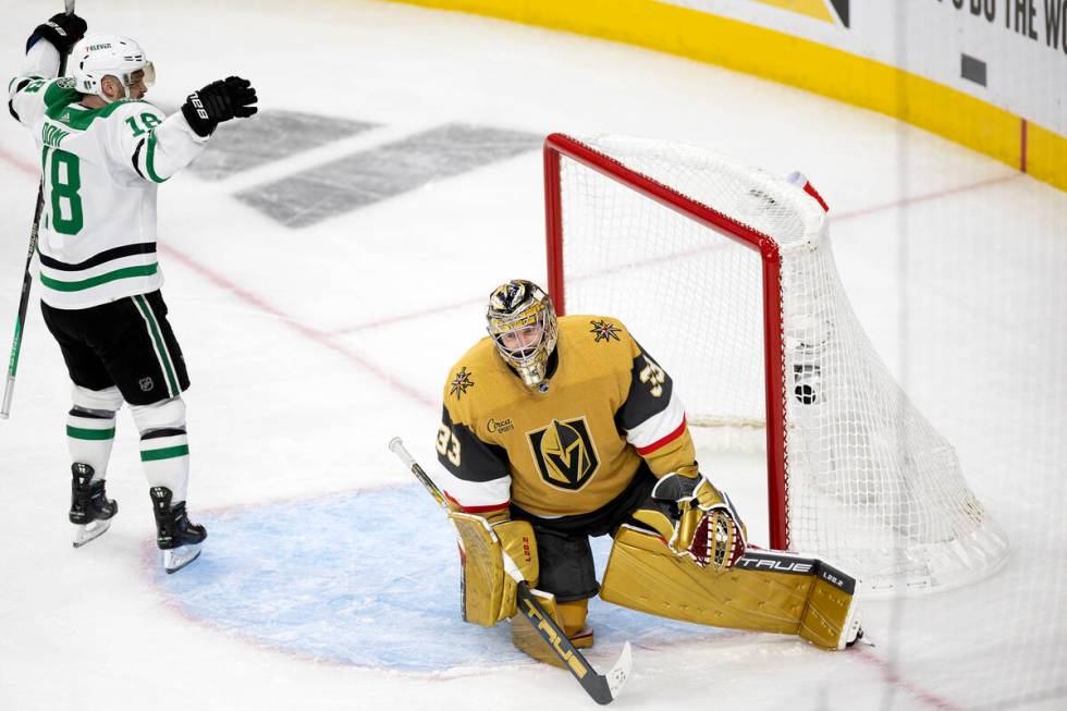 Dallas Stars center Max Domi (18) celebrates after Stars center Ty Dellandrea, out of frame, sc ...