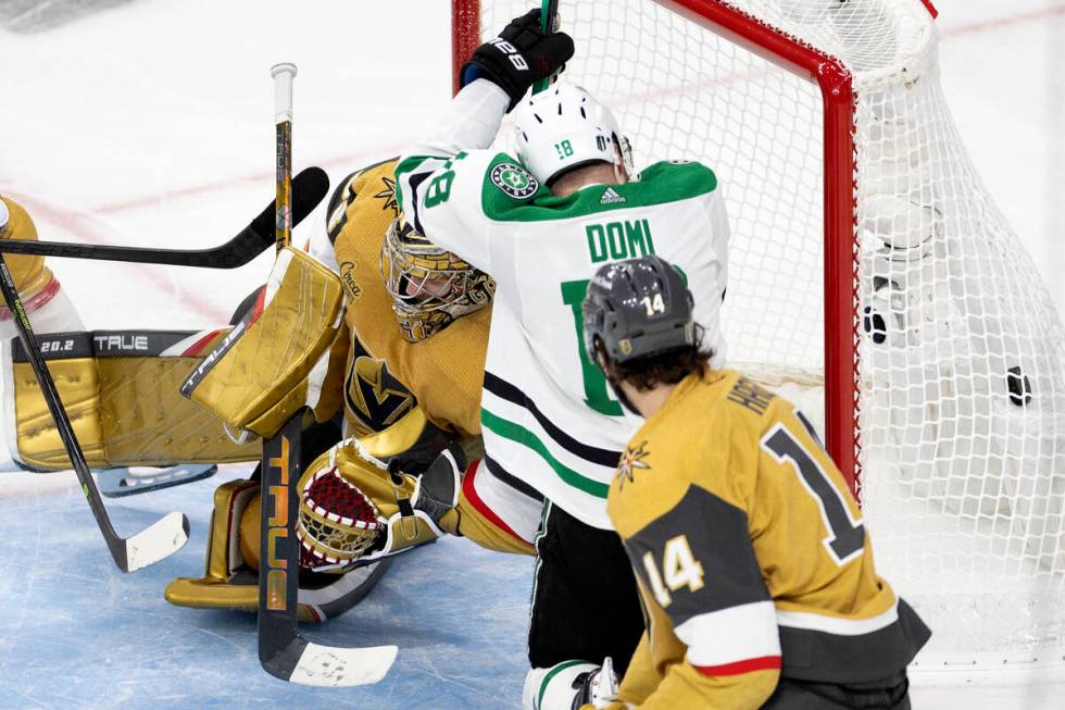 Golden Knights goaltender Adin Hill can’t save a shot by Dallas Stars center Ty Dellandr ...