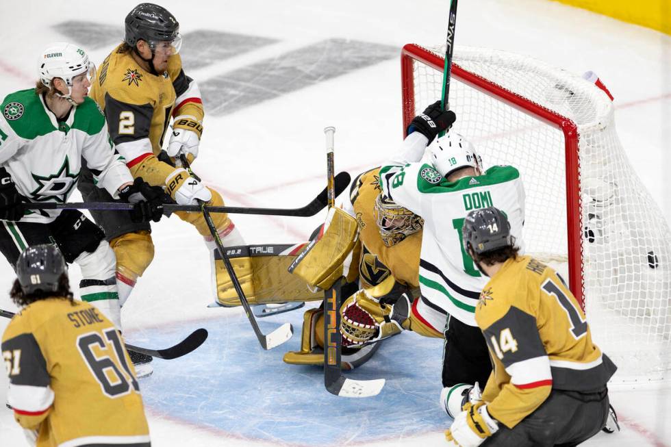 Golden Knights goaltender Adin Hill can’t save a shot by Dallas Stars center Ty Dellandr ...