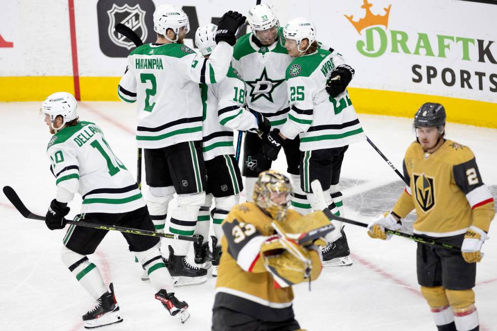 The Dallas Stars celebrate after center Ty Dellandrea (10) scored while Golden Knights goaltend ...