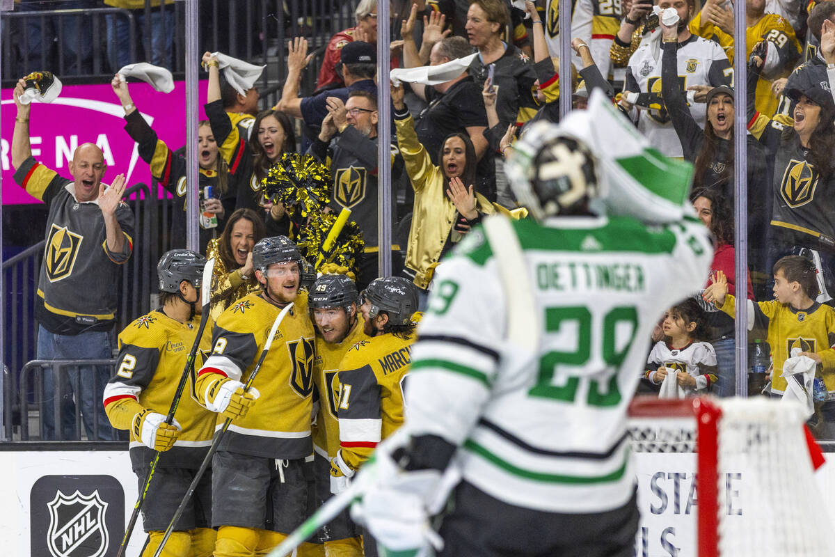 Golden Knights players celebrate a goal by center Ivan Barbashev (49) Dallas Stars goaltender J ...