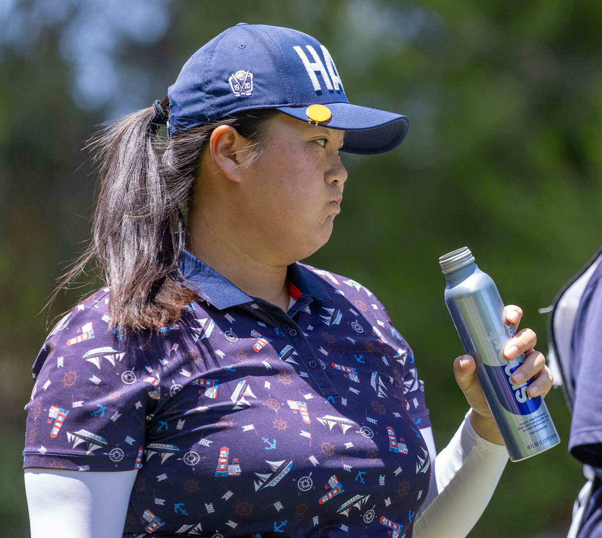 Angel Yin hydrates on hole 7 during the third day of Bank of Hope LPGA Match Play at Shadow Cre ...