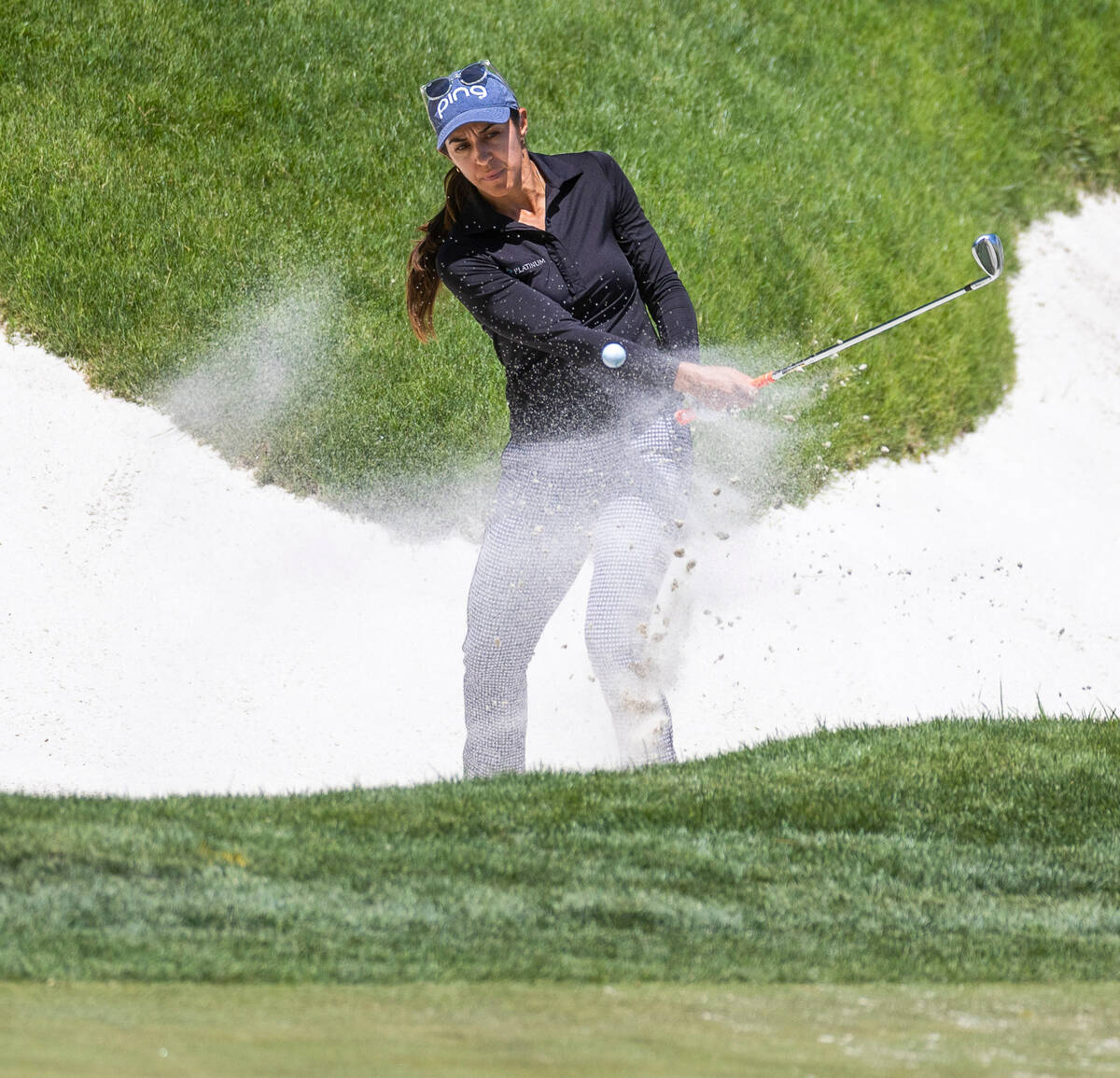 Paula Reto wedges out of the sand onto the green at hole 9 during the third day of Bank of Hope ...