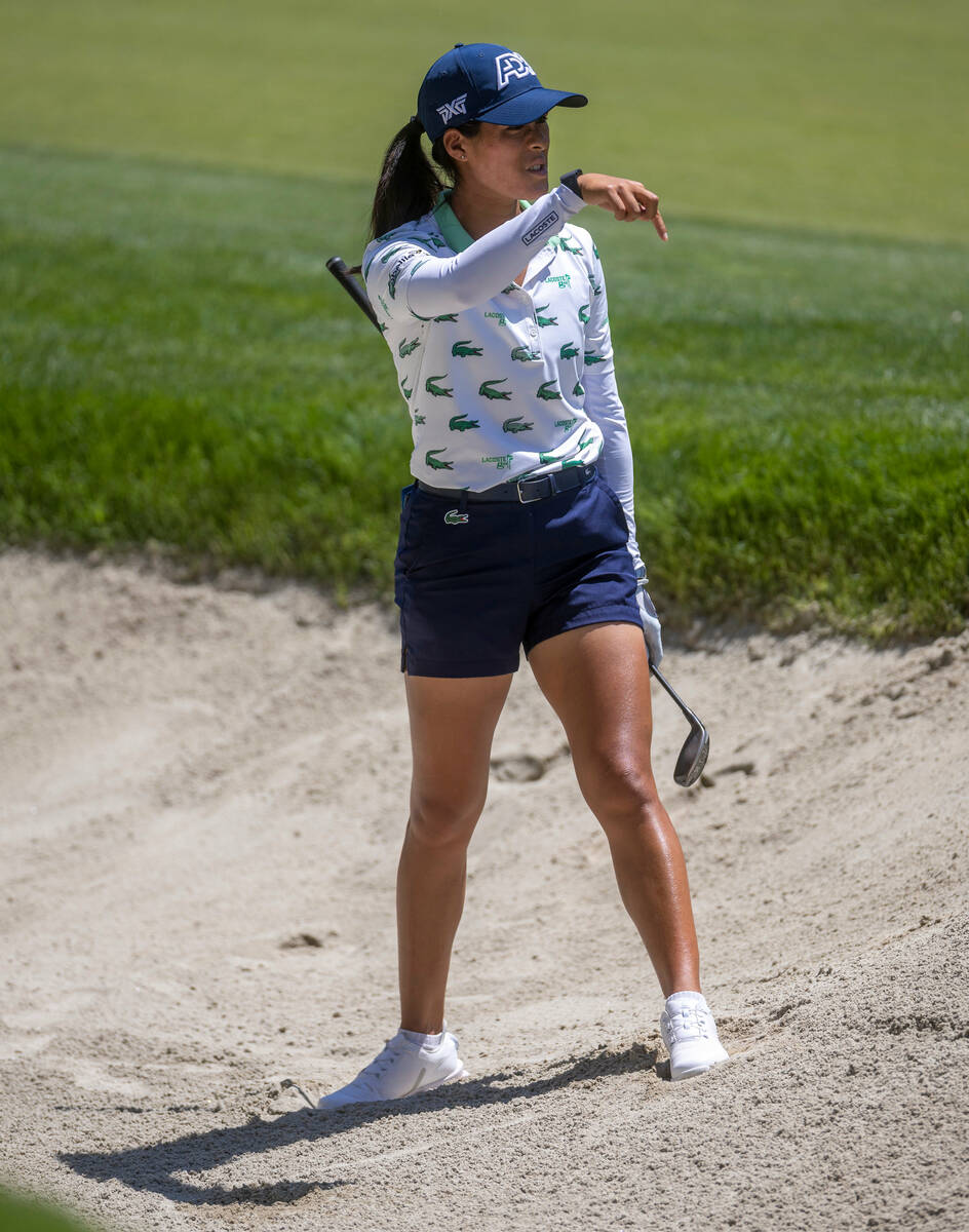 Celine Boutier wants the ball to lie down after digging out of the sand on hole 7 during the th ...