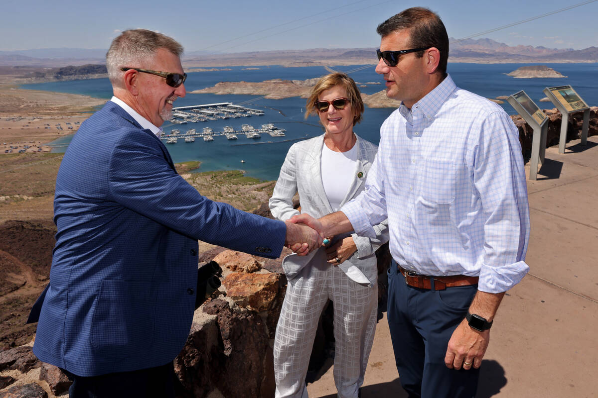 Greg Walch, Southern Nevada Water Authority general counsel, left, greets Nevada Democratic Rep ...