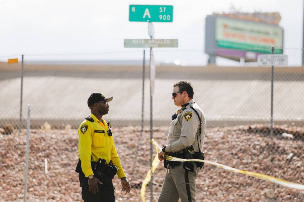 Las Vegas police officers investigate the scene of a fatal stabbing on Tuesday, May 30, 2023, a ...