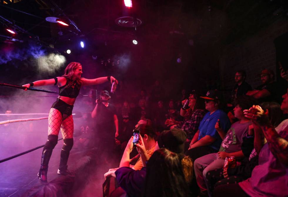 At PrideStyle, the show goes beyond the ring: Bryn Thorne tosses a drink into the crowd. (Rache ...