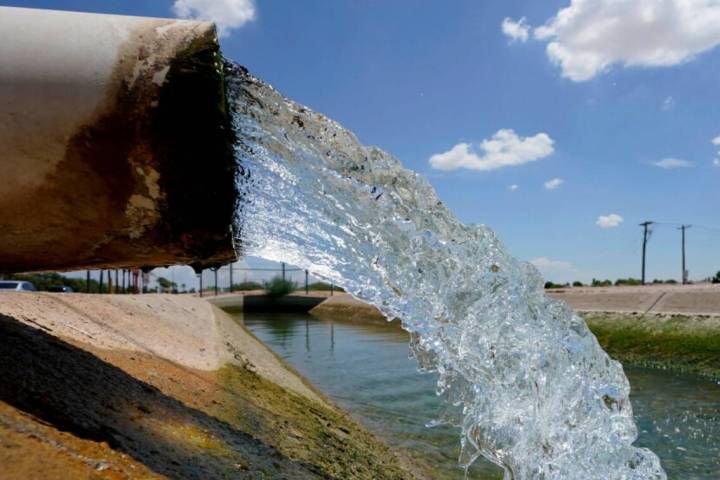 Water from the Colorado River diverted through the Central Arizona Project fills an irrigation ...