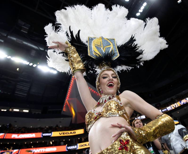A Vegas Belle dances in the stands before Game 1 of the NHL hockey Stanley Cup Finals between t ...