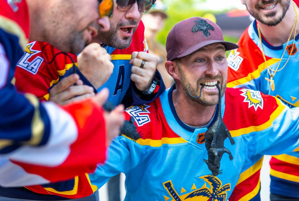 Florida Panthers fans complete with black rat get pumped outside before the start of Game 1 of ...
