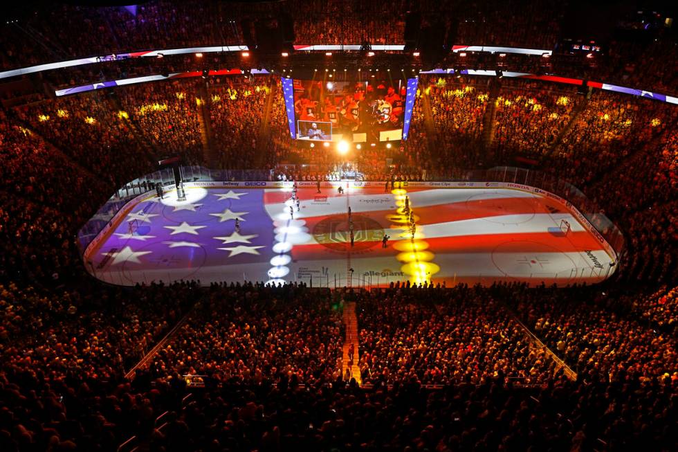 Players line up for the national anthem before Game 1 of the NHL hockey Stanley Cup Final, Gold ...