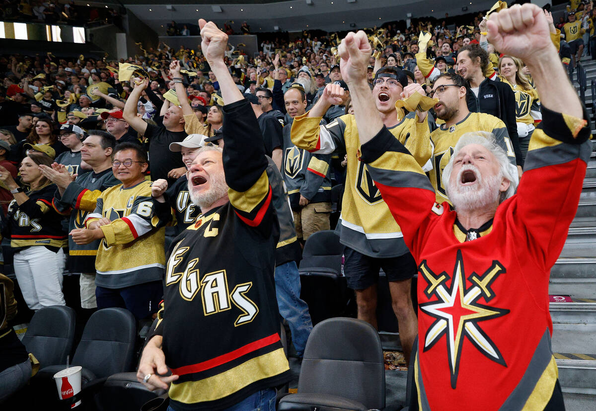 Golden Knights fans react after Golden Knights right wing Mark Stone (61) scored a goal against ...