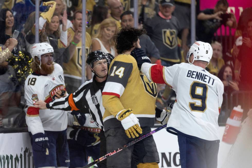 Florida Panthers center Sam Bennett (9) punches Golden Knights defenseman Nicolas Hague (14) wh ...