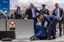 President Joe Biden falls on stage during the 2023 United States Air Force Academy Graduation C ...