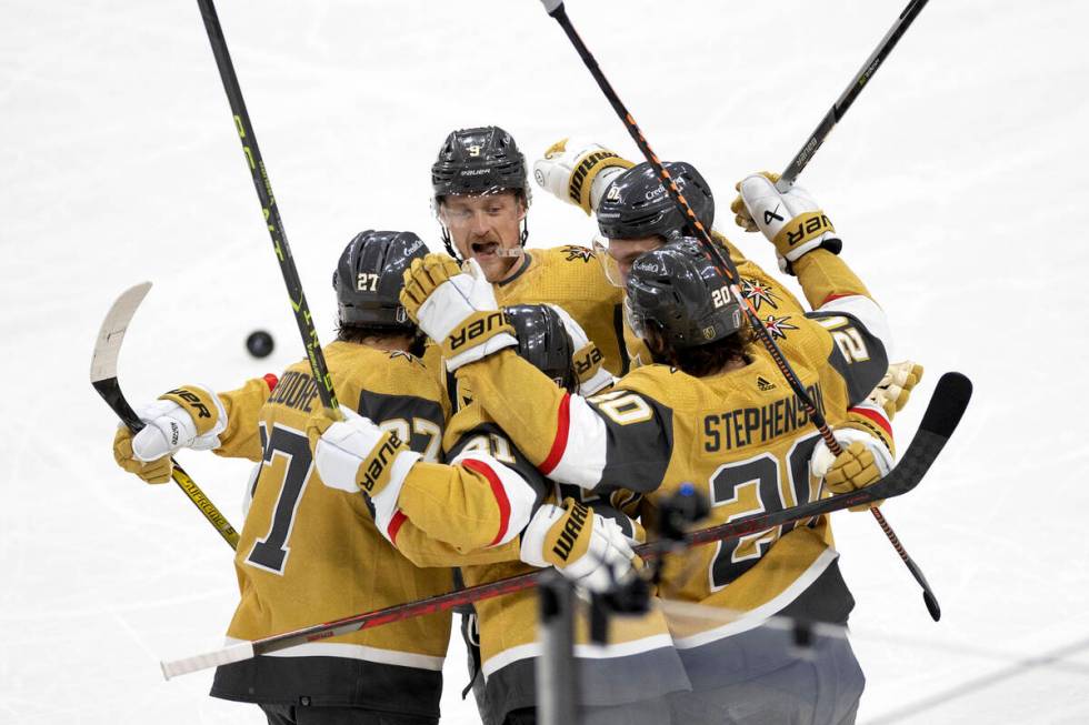 The Golden Knights celebrate after right wing Jonathan Marchessault (81) scored on the Florida ...