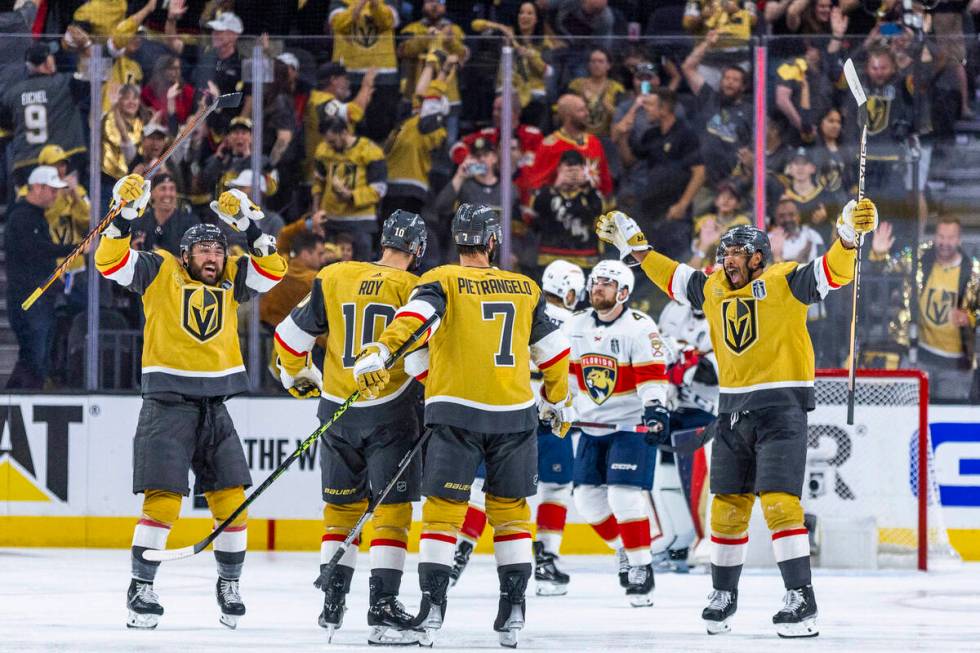 Golden Knights players celebrate another goal against the Florida Panthers in the second period ...