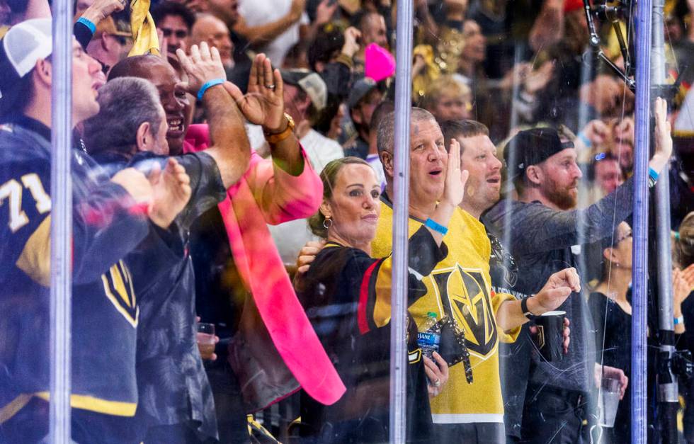 Golden Knights fans including Derek Stevens and his wife celebrate another goal against the Flo ...