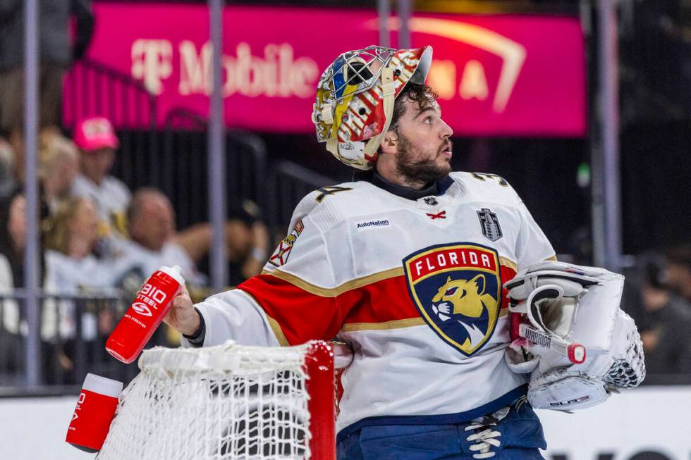 Florida Panthers goaltender Alex Lyon (34) looks to the replay after giving up another goal to ...