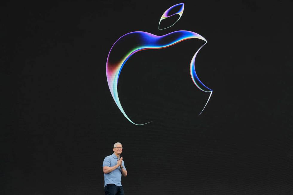 Apple CEO Tim Cook speaks during an annoucement of new products on the Apple campus Monday, Jun ...