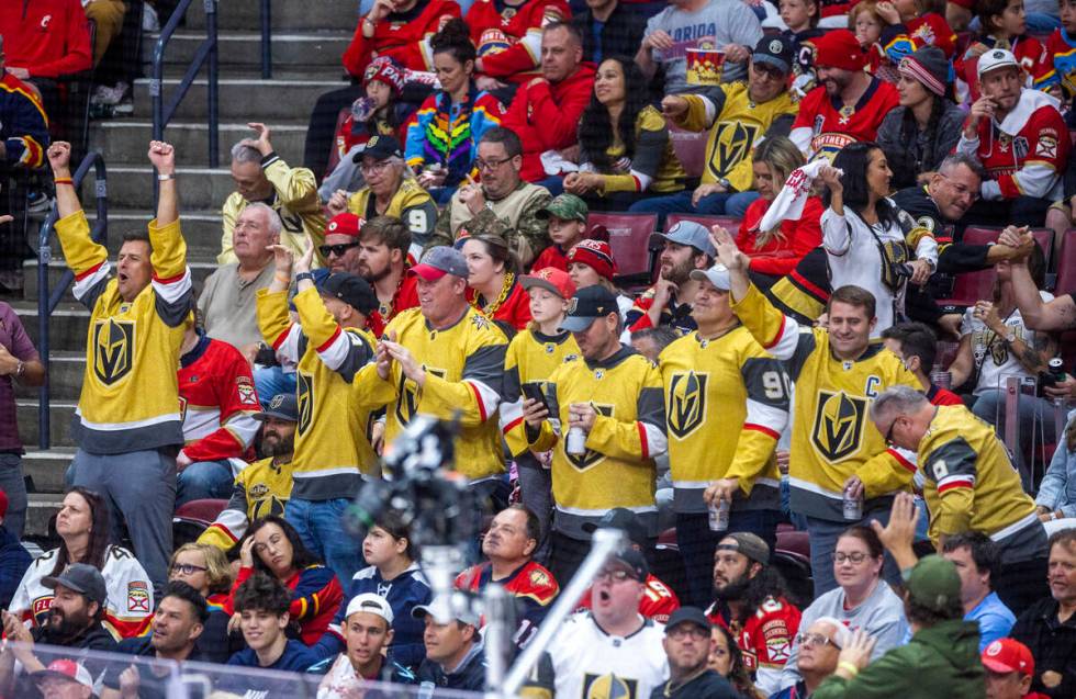 Golden Knights fans celebrate a goal against the Florida Panthers in the first period during Ga ...