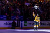 Golden Knights right wing Jonathan Marchessault (81) is celebrated as a player of the game agai ...